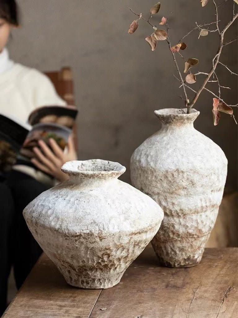 Wabi-Sabi White Distressed Rustic Vases on wooden table, with dried branches.